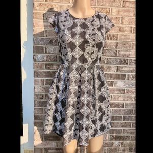 Dark Gray and White Classy Boho Print Skater Dress
By Altar’d State